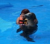 Edna Kerr in water with Sea Lion