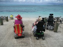 Wheelchair beside beach